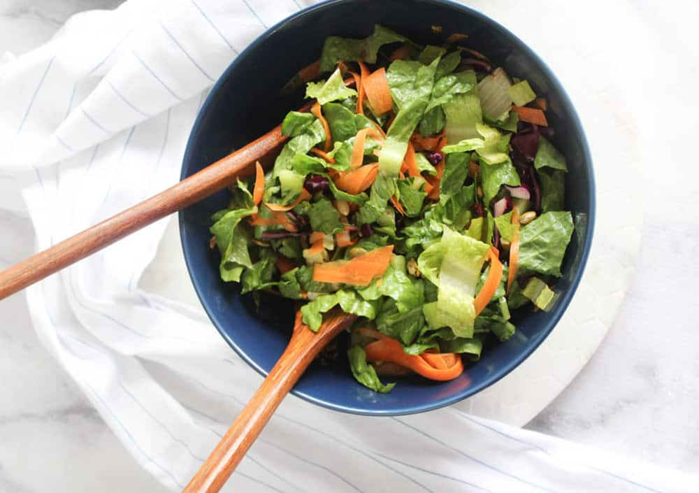 overhead view of romaine salad in a bowl